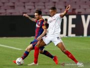 Barcelona Berbagi Poin dengan Sevilla