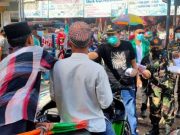 Ansor Bagikan Masker di Pasar dan Semprotkan Disinfektan
