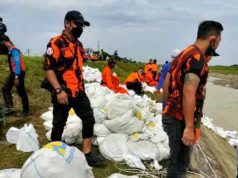 Cegah Banjir, Tim Rescue Pemuda Pancasila Grobogan Bekerja Bakti