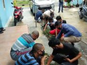 Polisi Gelar Baksos dan Kerja Bakti Gandeng Mahasiswa Asal Papua