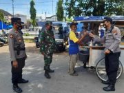 Polres Sinergi Dengan Kodim 0705 dan Pemda Kabupaten Magelang Bagikan Masker di Pasar Borobudur