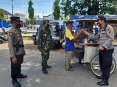 Polres Sinergi Dengan Kodim 0705 dan Pemda Kabupaten Magelang Bagikan Masker di Pasar Borobudur