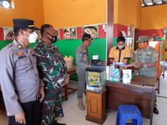 Petugas Gabungan Gencarkan Sosialisasi PPKM Darurat