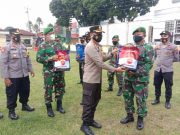 Polres Wonosobo Serahkan Bantuan Beras dan Paket Sembako bagi Warga Terdampak PPKM Darurat