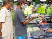 Polres Blora Edukasi Warga dengan Buka Stan Masker dan Bansos Pakaian Layak Pakai