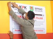 Tim Gabungan Pasang Tanda Peringatan di Rumah Makan Yang Tidak Taat Pajak