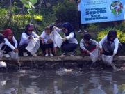 Hari Lingkungan Hidup Sedunia, Pesepeda Magelang Tebar Ikan di Kali Bening Hari Lingkungan Hidup Sedunia