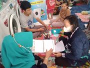 Tim PkM FE USM Berikan Sosialisasi Pengelolaan Keuangan di Reza Laundry