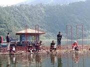 Bupati Wonosobo Bersama Komunitas Motor Tebar Benih Ikan di Telaga Menjer