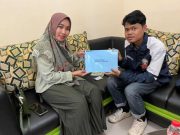 Tim 1 KKN Undip Membuat Buku Induk untuk Perpustakaan Desa Kaligangsa Kulon Dilengkapi dengan Petunjuk Pengisian Nomer Panggil