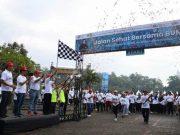 Semen Padang Rayakan HUT Ke-25 Kementerian BUMN dengan Jalan Sehat Bersama