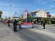 Komunitas Penggemar Sepeda Tua dan Warga Bersama Satlantas Grobogan Upacara Pengibaran Bendera di Perempatan Danyang