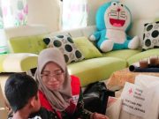 Senyum Ramdan, Tuna Daksa asal Desa Kunir Melihat Alat Lukis dari PMI Jepara