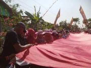 Peringati 79 Tahun Kemerdekaan RI, Warga Karangtengah Blora Jahit Kain Merah Putih Sepanjang 79 Meter di Jalan Desa