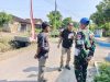 Unit Intel Turun Langsung Pastikan Penutupan TMMD Aman Tanpa Ganggu Aktivitas Warga